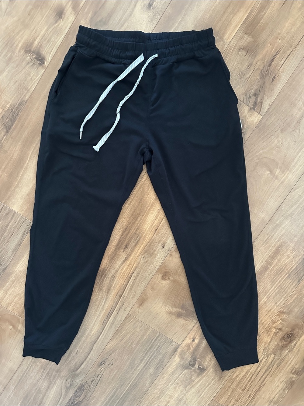 Vuori Black performance Jogger Sweatpants with White Drawstring